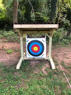 an outdoor archery target set up in the woods