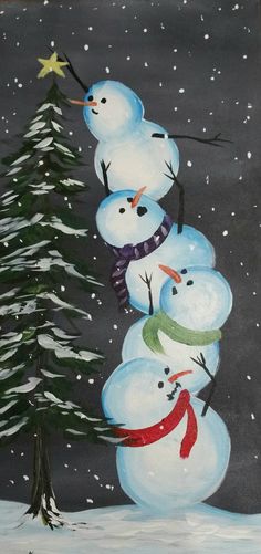 three snowmen are standing in front of a christmas tree