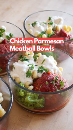 four glass bowls filled with food on top of a wooden table and the words chicken parmesan meatball bowls