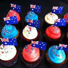 cupcakes with australian flags and stars on them are arranged in rows, including one for the flag