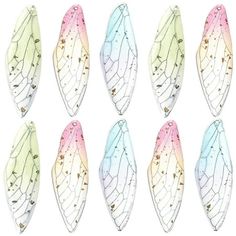 six different types of butterfly wings in pastel colors with gold dots and tiny stars