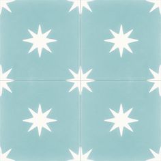 a blue and white tile with stars on it