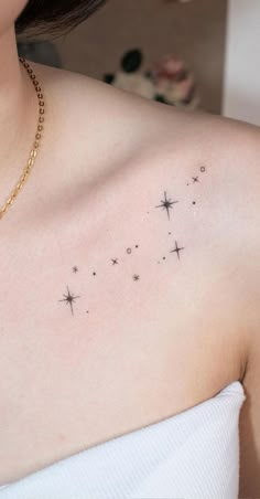 a woman's chest with stars on it