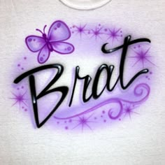 the word bratt is painted in purple and black on a white t - shirt