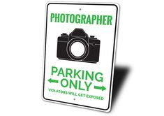 a parking only sign with an image of a camera and the words photographer on it