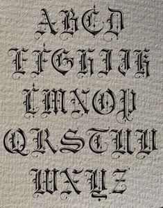 an old fashioned font that has been made into some type of paper