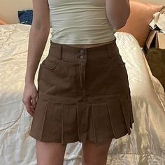 In Brown Size Xsmall Measurements Flat: Waist 12”, Length 14” Denim Mix, Pleated Hem, High Waisted Nwt Condition Non-stretch Mini Skirt Casual, Y2k Cotton Mini Skirt, Y2k Cotton Mini Skirt For Fall, Brown High Waist Pleated Mini Skirt, High Waist Brown Pleated Mini Skirt, Brown High-waist Pleated Mini Skirt, Cotton Denim Mini Skirt With Pleats, Y2k Style Cotton Mini Skirt, Y2k Style Mini Cotton Skirt