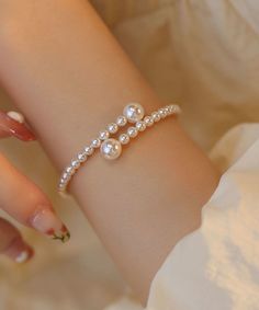 Women White Pearl Adjustable Solid CuffMade of fine Pearl.Length: 24cm/9.36". Matches easily with daily hairstyle, dresses & Shirts Kawaii Charms, White Pearl Bracelet, Daily Hairstyles, Handmade Beaded Jewelry, Beaded Bracelets Diy, Diy Clay Crafts, Bead Jewelry, Diy Clay