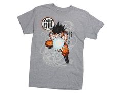 a gray shirt with an image of the character gohan holding a white ball in his hand