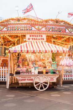 a carnival food stand with lots of candy