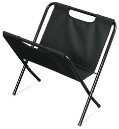 a black folding chair with a bag on the back