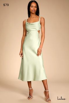 You'll be the girl they'll never forget in the Lulus Stun to Remember Sage Green Satin Cowl Neck Cutout Midi Dress! Smooth, luxe satin shapes a draping cowl bodice (with hidden padding for extra support) supported by long shoulder straps that tie across an alluring open back. A high, elasticized waist sits atop an A-line skirt that falls to a midi hem, finishing this go-to going out dress. Hidden back zipper/clasp. Fit: This garment fits true to size. Length: Mid-calf length. Size medium measure Silk Dress Shoes, Cutout Midi Dress, Sage Green Dress, Green Silk Dresses, Sage Green Floral, Going Out Dress, Spring Floral Dress, Green Satin, Going Out Dresses