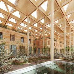 the inside of a building with lots of windows and plants growing on top of it