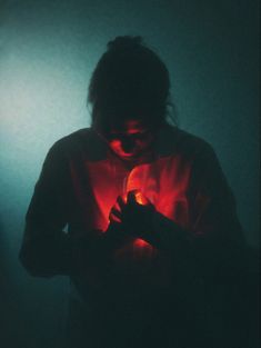 red glow, red light, broken heart, creative photo, photoshoot, Glowing Heart Photography, Glowing Heart Art, Light And Dark Photography, Red Light Portrait, Red Cinematography, Glowing Person, Creative Portrait Photoshoot Ideas, Red Light Photoshoot, Glowing Aesthetic