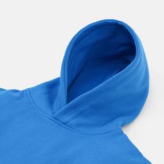 Experience ultimate comfort and warmth with our Monk Hue Blue Heavy Hoodie. Designed for those who appreciate a soft, loose-fitting style, this hoodie is ideal for layering before and after workouts or simply relaxing on a casual day. Made from a heavy-weight cotton/polyester blend, it offers the perfect balance of durability and softness. Featuring an oversized design and drop shoulder, this pullover hoodie ensures a relaxed fit that moves with you. The lack of ribbing on the waistband adds to Oversized Blue Hoodie For Streetwear, Winter Workout Comfortable Hoodie, Comfortable Winter Workout Hoodie, Workout Hoodie With Drawstring Hood, Comfy Solid Color Hoodie With Adjustable Hood, Comfy Solid Hoodie With Adjustable Hood, Comfy Blue Sweats With Ribbed Cuffs, Cozy Fit Hooded Hoodie For Workout, Comfortable Sweatshirt With Adjustable Hood