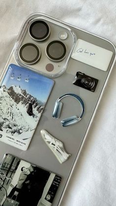 an iphone case with several different items on it