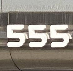 the number 555 is shown on the side of a car