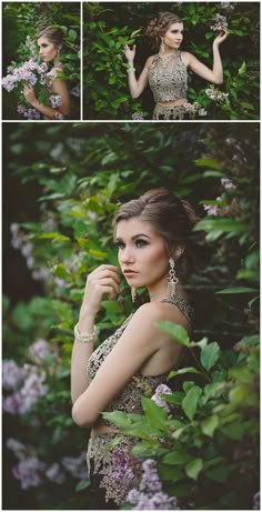 a woman in a dress standing next to some bushes and flowers with her hands on her hips