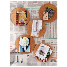 three cork coasters with pictures and magnets attached to them on top of newspaper