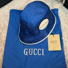 New Original Gucci Bucket Hat With Tags And Dust Bag. Size M 58 Cm. Gucci Bucket Hat, Gucci Eyeglasses, Mens Shampoo, Gucci Brand, Uniqlo Bags, Vintage Chanel Handbags, Seersucker Pants, Swim Shoes, White Hat