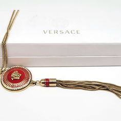 Thank You For Visiting Runwayreadyjewelry.Com! (@Runwayreadyjewelry On Instagram + Pinterest) Measurements: 24"L Necklace With Additional 7"L And 2"W Pendant (Tassel Itself Is 4.5"L And .5"W) Metal: Gold Tone Findings: Lobster Claw Finish: Polished Comes With Box Versace Is One Of My Favorite Brands And Let Me Tell You Why. They Are A Company That Has Been Creating In Your Face, Out Of The Box, Glamorous, Bold And Edgy Looks Dating All The Way Back To 1978. They Are Pioneers That Set Trends Inst Necklace Versace, Versace Choker, Versache Necklace, Luxury Enamel Amulet Necklace, Versace Pendant Gold, Edgy Looks, Versace Jewelry, Medusa Head, Greek Key Pattern