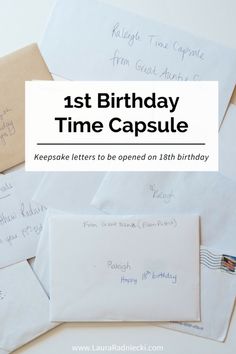 some envelopes with the words 1st birthday time capsule written on them