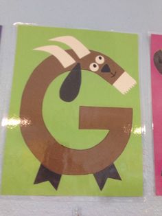 the letter g is for horse and an e is for dog on two different colored cards