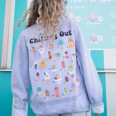 Women's printed sweatshirt with “Chilling Out” slogan and illustrated ice cream guide. Which will you choose? Chill out this summer in this ice cream dream graphic sweater. Super-comfy oversized fit. Makes a great gift and a sweet self purchase for summer staycation. All Batch1 products are lovingly designed, printed and packed by hand in the UK at Batch1 HQ.  Our garments are made to order to minimise wastage and printed using water-based, eco-friendly inks. We are committed to creating on-tren Summer Staycation, Women Slogan, Slogan Sweatshirt, Graphic Sweaters, Printed Sweatshirts, Sustainable Fashion, This Summer, The Uk, Sweatshirts Women