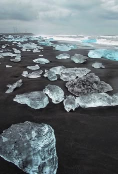 ice flakes are on the black sand beach