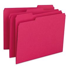 pink file folders stacked on top of each other