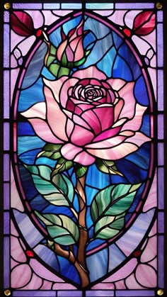 a stained glass window with a rose on it