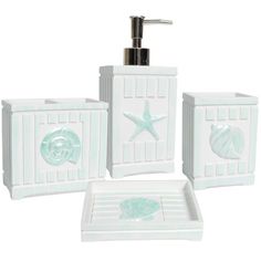 four pieces of bathroom accessories including soap dispenser, soap dish and toothbrush holder