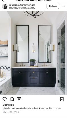 a bathroom with two sinks and mirrors on the wall next to a bathtub that is black and white