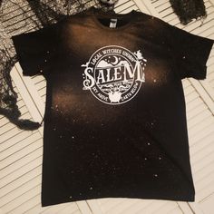 *Salem Bleached Graphic Tee *Gildan Ultra Cotton *Large- Unisex Sizing *Screen Print Transfer *Handmade **Being Hand Made, Shirts Will Come Without Tags. All Shirts Are Washed On Gentle Cycle And Laid Flat To Dry After The Bleaching Process. Fall Autumn Halloween Salem Witches Coven Cauldron Spooky Trick Or Treat Halloween Acid Wash Cotton T-shirt, Acid Wash Cotton T-shirt For Halloween, Halloween Acid Wash Screen Print T-shirt, Black Bleached Cotton Tops, Band Merch Bleached Crew Neck T-shirt, Washed Black Bleached Crew Neck T-shirt, Black Bleached Relaxed Fit Tops, Black Bleached Graphic Tee T-shirt, Black Bleached T-shirt For Streetwear