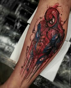 spiderman tattoo design ideas for men and webs of ink on the right arm