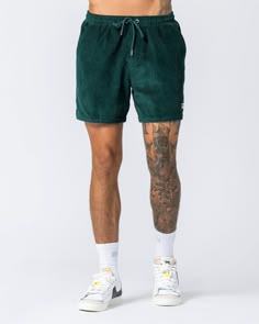 These Daily Corduroy Shorts are a classic look you'll love to wear all year-round. Crafted with a regular fit from a soft corduroy fabric, these shorts are sure to become a staple in your wardrobe.- True to size (Regular fit)- Encased elastic waistband with draw cords - Front pockets- MN Rubber patch logo - Corduroy Fabric- 80% Cotton 20% Rayon Model: Natal - 186cm, wears size L tops & M shorts Short Shorts Men Outfit, Short Shorts Men, Masculine Women, Mens Casual Shorts, 1st House, Vegan Supplements, Rubber Patch, Corduroy Shorts, Cropped Joggers