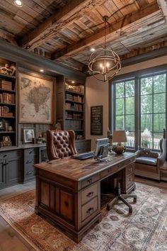 a home office with an old world map on the wall and lots of bookshelves