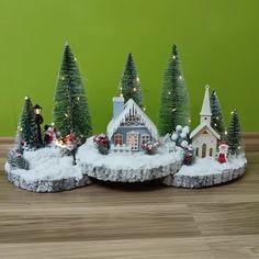 small christmas village with lights and trees