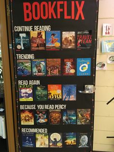 a book display with books on it in front of a door that says, bookflix continue reading