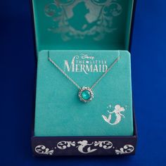 the little mermaid necklace is in its box