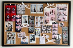 a cork board covered in pictures and magnets with hearts attached to the sides, hanging on a wall