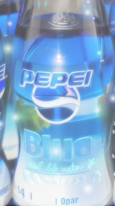 several bottles of pepsi are stacked on top of each other