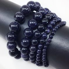 ✦Bead: Goldstone /  Gold Stone ✦Color: Blue ✦Shape: Smooth Round Beads ✦Size: 4mm, 6mm, 8mm, 10mm, 12mm ✦Average Strand Weight: < 4oz ✦QTY: 1 pc / package ♕Beautiful & High Quality Bracelet♕  Our bracelet length 7.5", fit with a 6.75" wrist, it is our standard size. We offer to resize bracelet 5"-8" to fit your wrist! If you like the different bracelet lengths, please let us know your wrist size. We are happy to take care of it for you. You can see our Personalization Option. Thank you! MEASURE YOUR WRIST:    - Measure around at the wrist bone in tape or even a strip of paper.   - Choose a place where you would normally wear a bracelet.  Make it as loose or snug.   - To use the strip of paper, mark where the end of the bracelet needs to be and then measure the paper with a ruler.   - Incre Goldstone Bracelet, Blue Goldstone, Gold Stone, Color Calibration, Gemstone Healing, Bracelet Sizes, Last Minute Gifts, Round Beads, Crystal Healing