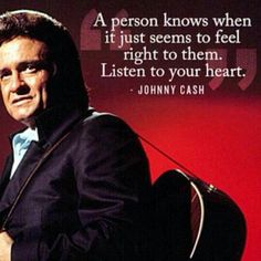 a man standing in front of a red background with a quote from johnny cash on it