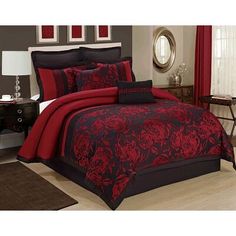 a red and black bed in a bedroom