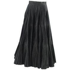 Serge & Real Black Taffeta Pleated Long Skirt - M. This Serge & Real long skirt is black taffeta. It is pleated and loose. This skirt is in good condition with minor marks and a sticky residue on it- needing dry cleaning. Size medium. Measurements Waist: 27" Length: 37.25" Black Accordion Pleats Voluminous Skirt, Black Voluminous Skirt With Accordion Pleats, Black Accordion Pleats Tiered Skirt, Black Tiered Skirt With Accordion Pleats, Black Skirt Pleated, Long Black Skirt, Taffeta Skirt, Pleated Long Skirt, Skirt Pleated