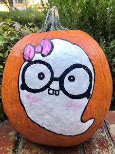 a pumpkin decorated with an image of a cartoon character