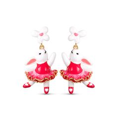 Unique and stunning, these sweet bunny earrings will take your breath away. Made in sterling silver and hand-enameled, each earring features a little flower as the stud and a dancing white rabbit in a pink ballet skirt as the drop part. This adorable piece captures the essence of whimsy and adds a touch of playfulness to your ensemble. An incredible addition to any jewelry collection, but especially for those who love rabbits, spring and Easter celebrations.Weight: 3.2 gWidth: 14.55 mmHeight: 28 Whimsical Pink Enamel Earrings, Pink Ballet Skirt, Silver Earrings Online, Bunny Earrings, Easter Celebration, White Rabbit, Online Earrings, Rabbits, Quality Jewelry