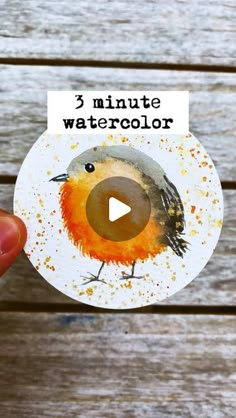 someone holding up a sticker with the words 3 minute watercolor on it