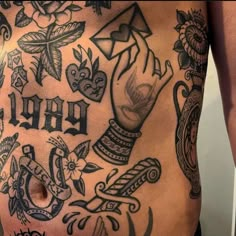 a man's stomach with tattoos and lettering on the side that says, rad